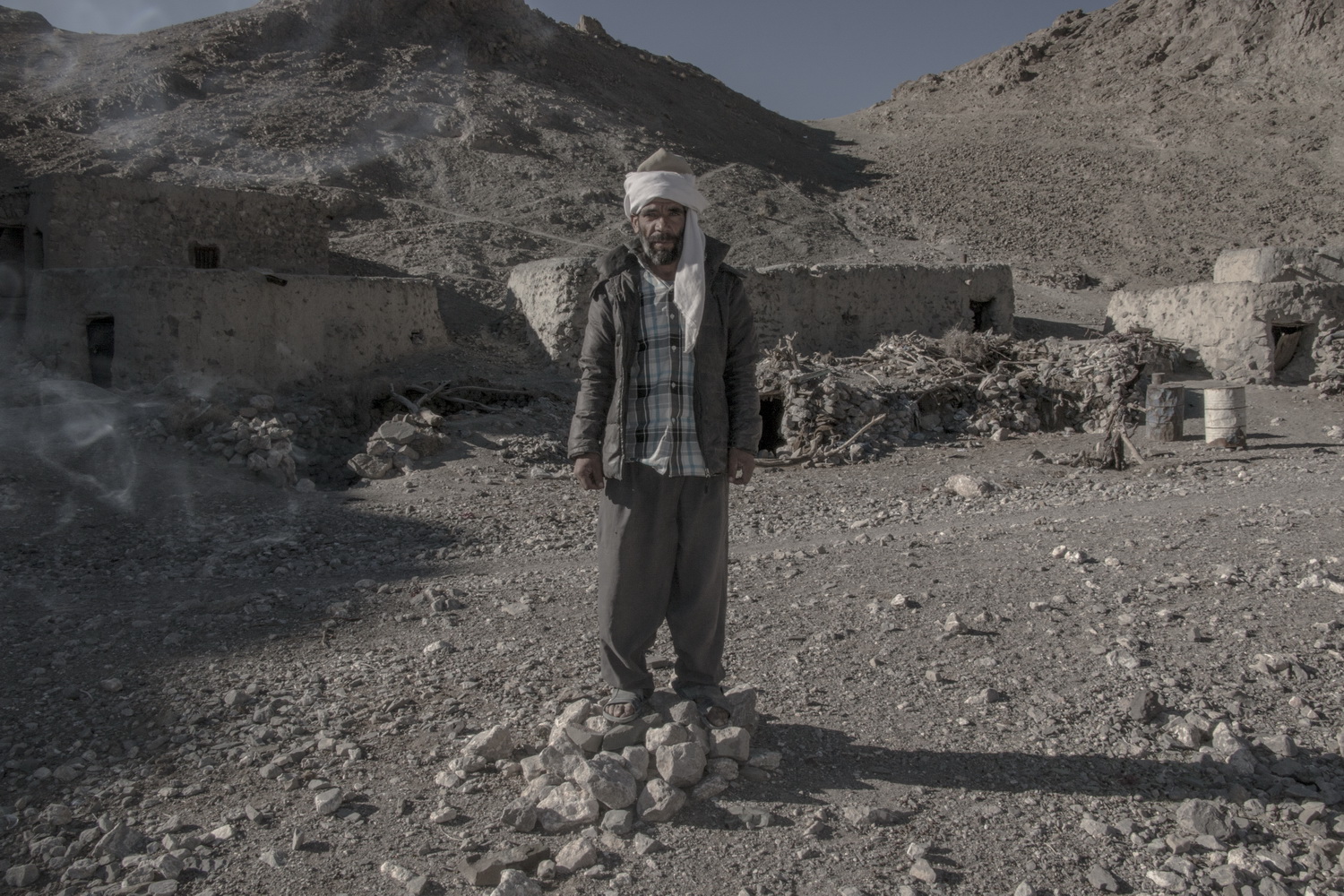man standing on stone