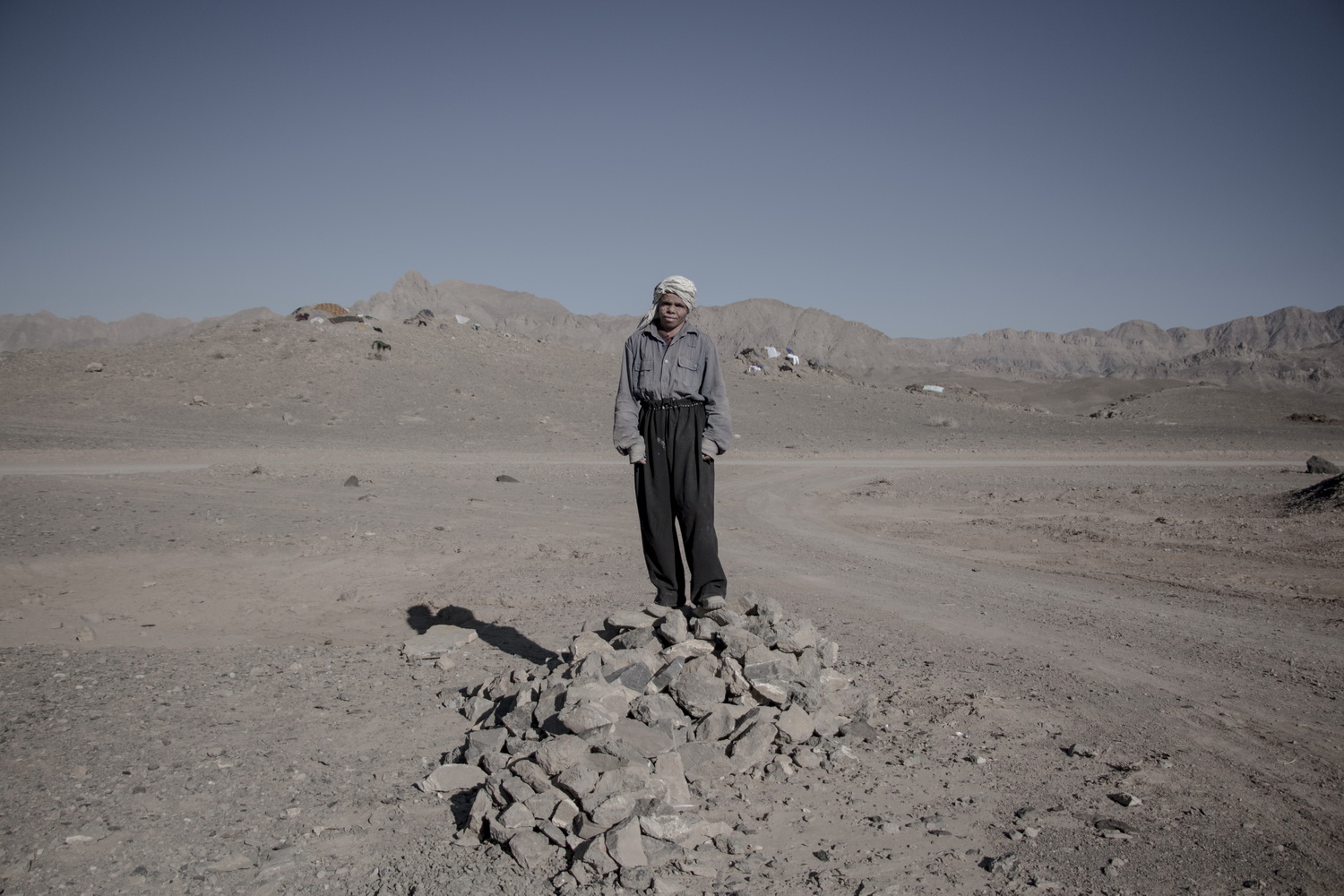 man standing on stone