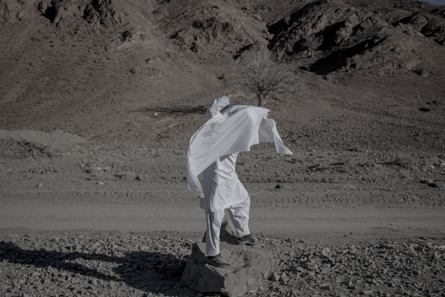 man standing on stone