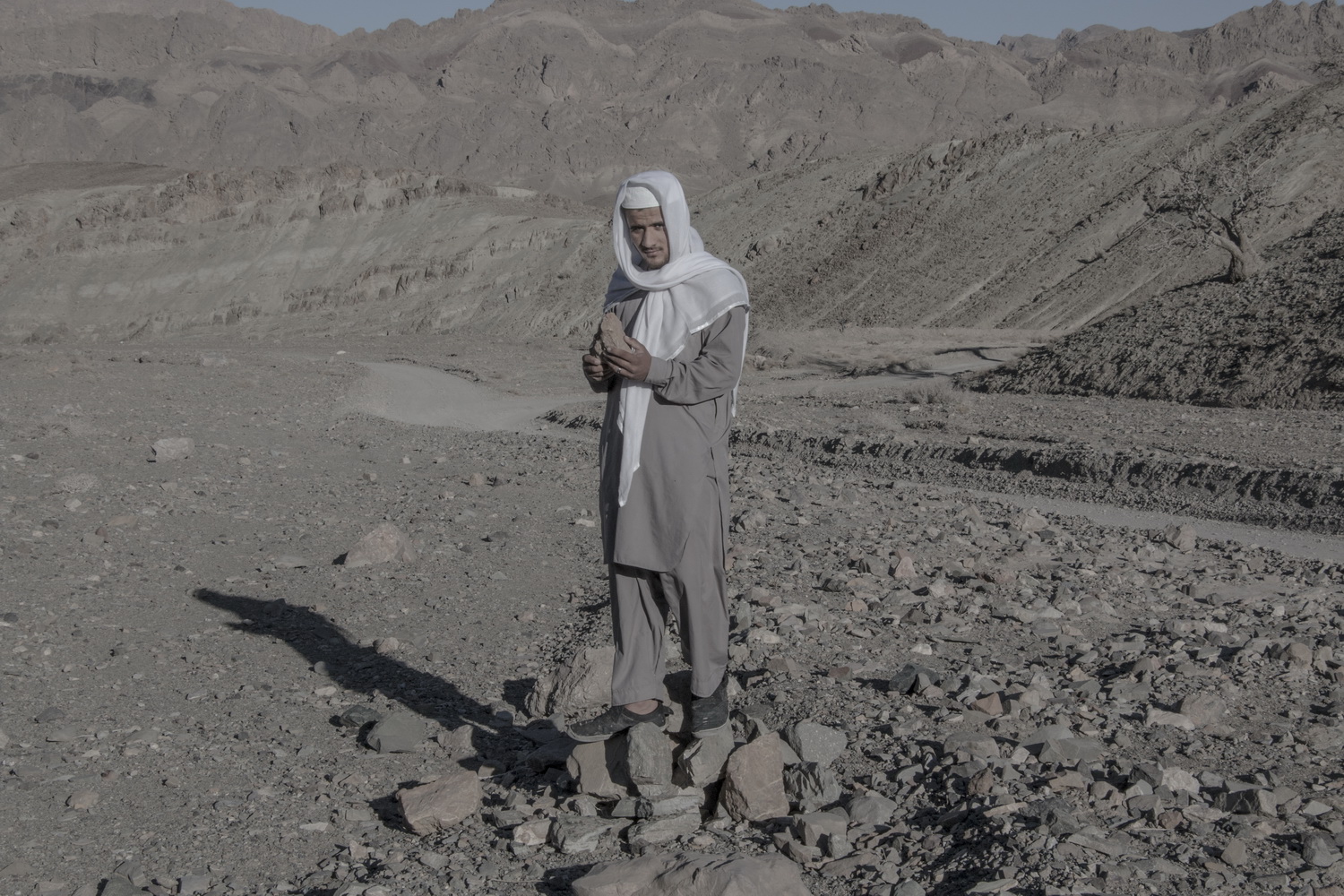 man standing on stone