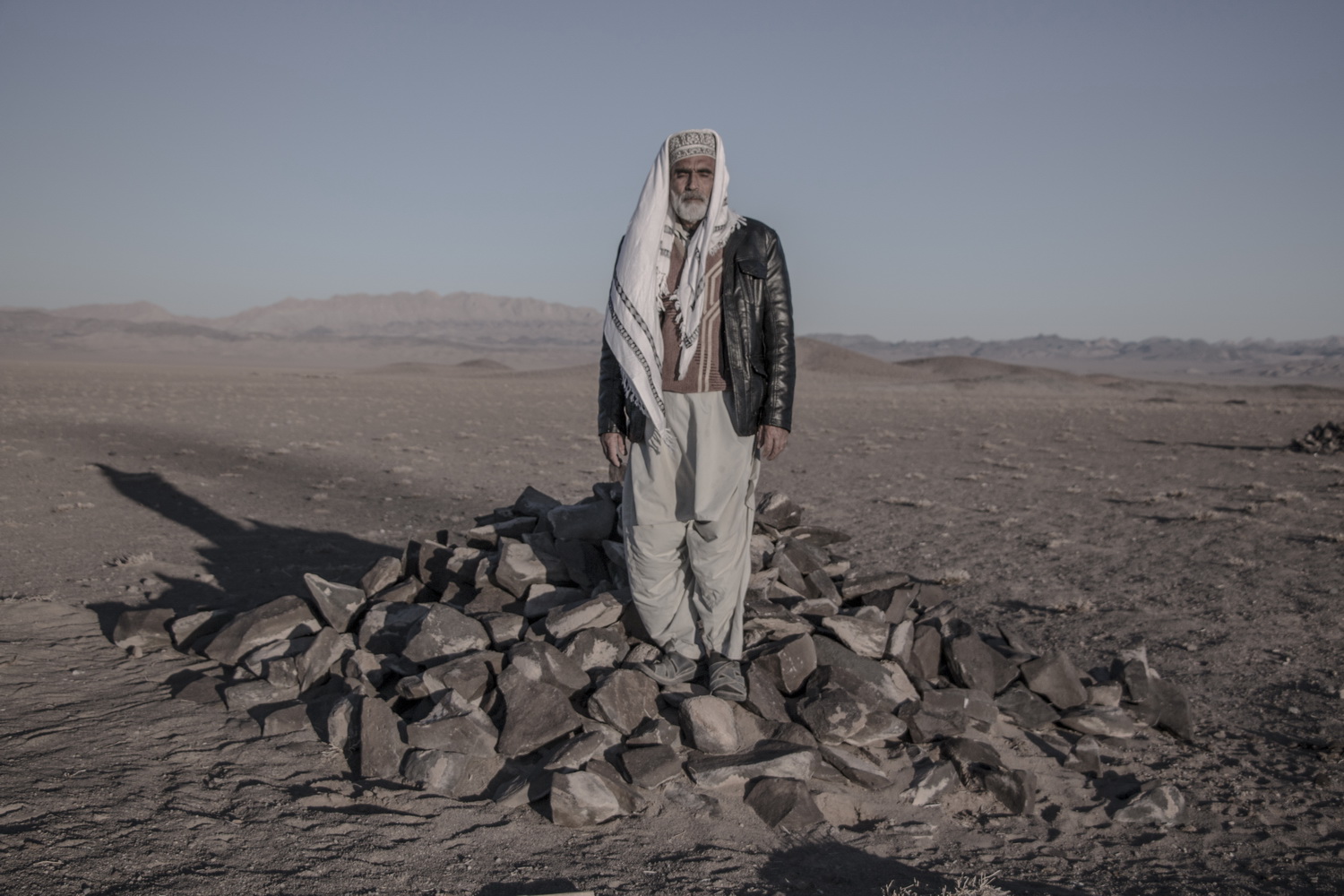 man standing on stone