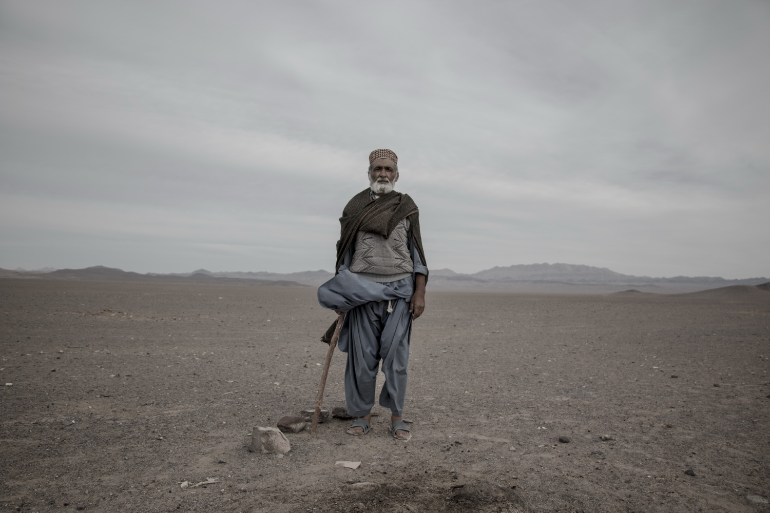 man standing on stone